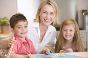 teacher and students smiling